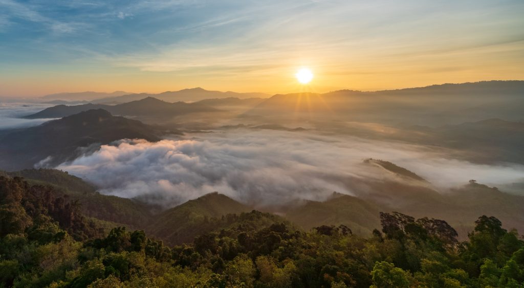 Beautiful morning Sunrise and Fog flow over mountain in Ai yerweng, Yala, Thailand